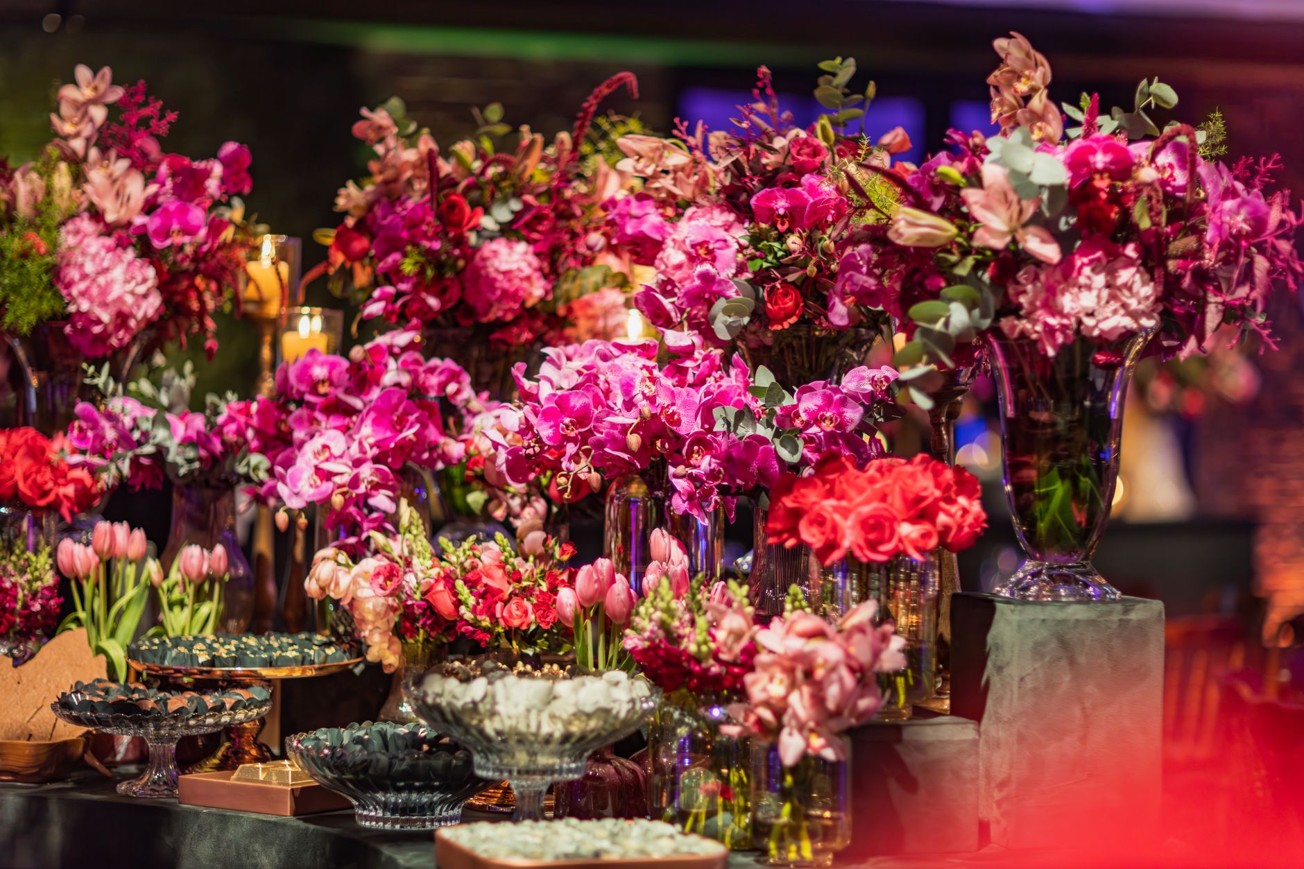 Colorful floral arrangements create a stunning centerpiece for celebratory events.